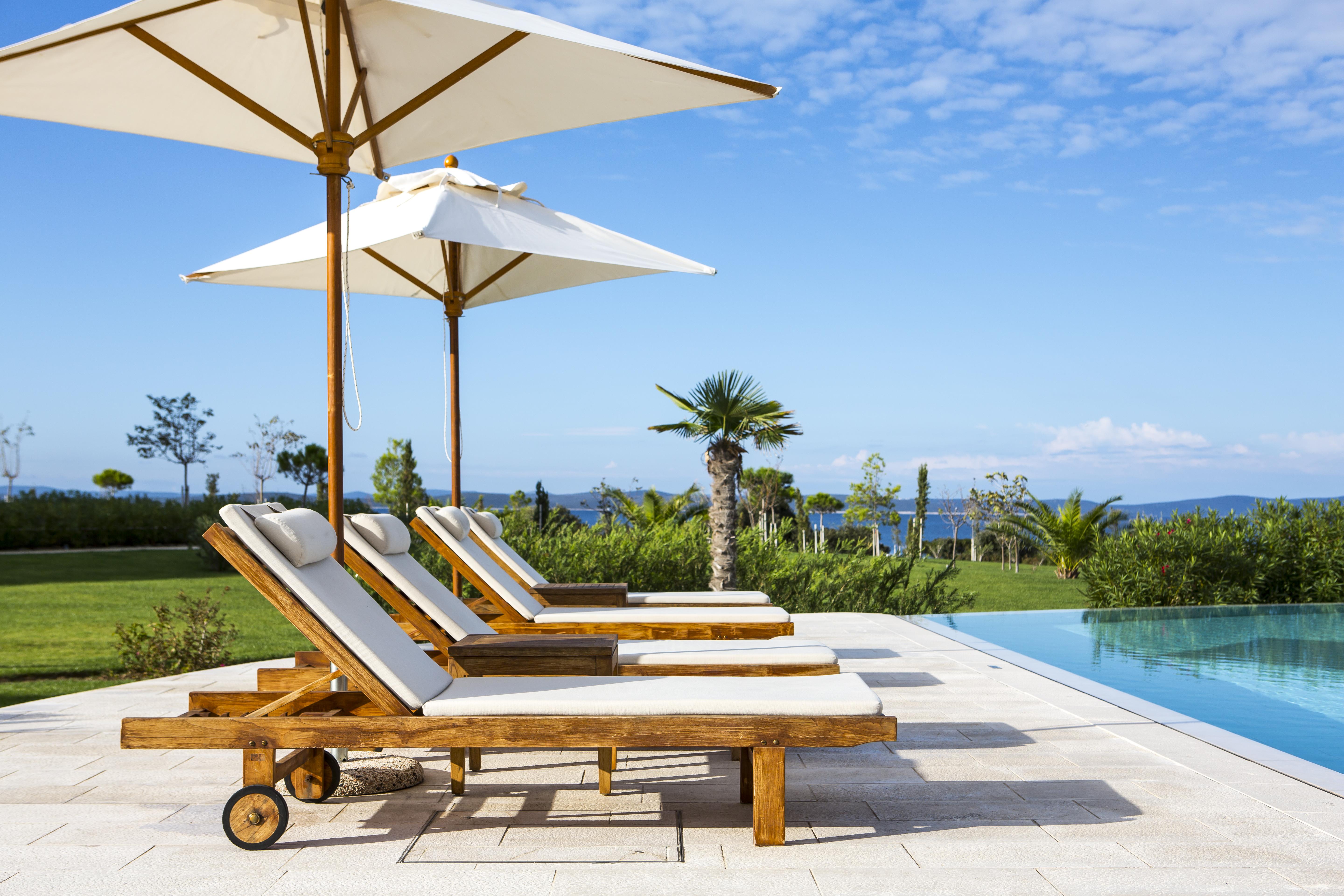 Falkensteiner Hotel & Spa Iadera Petrcane Exterior photo A poolside lounge chair